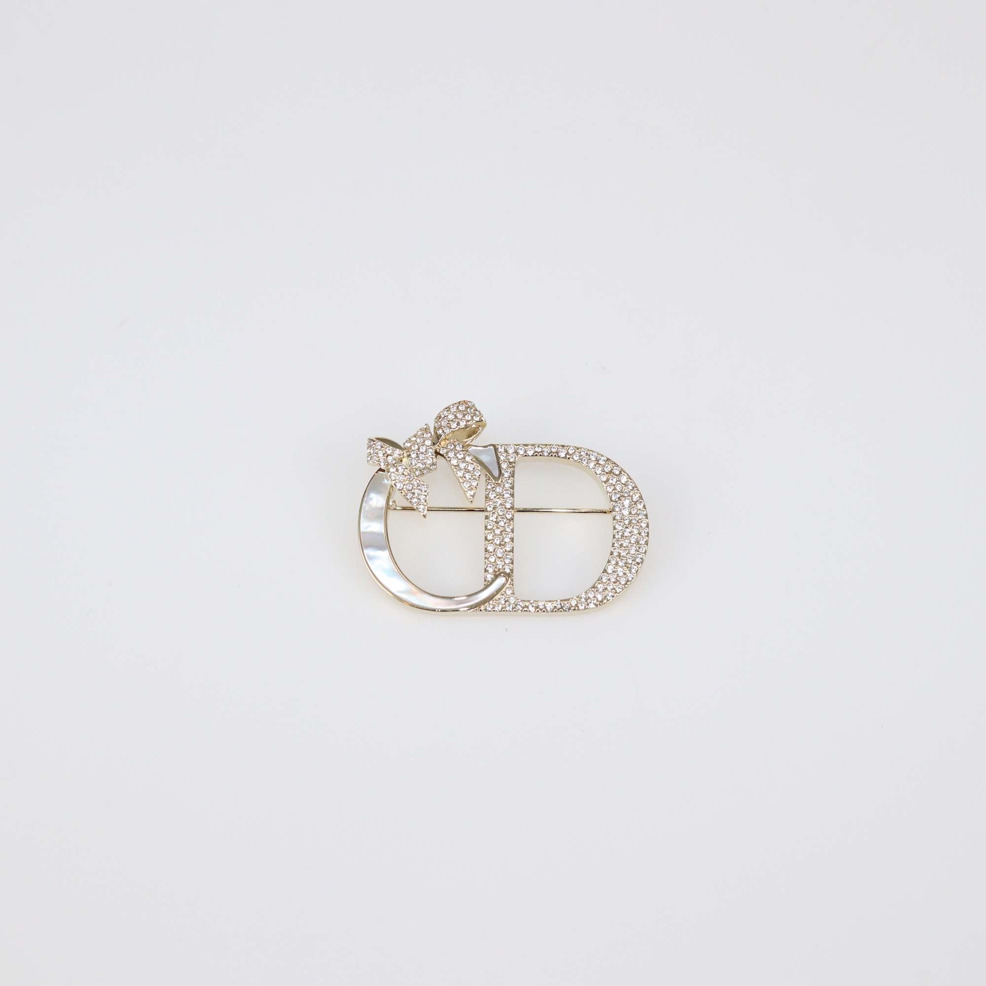 Christian Dior Gold Finish Metal Mother of Pearl Dior Shiny Bow Brooch