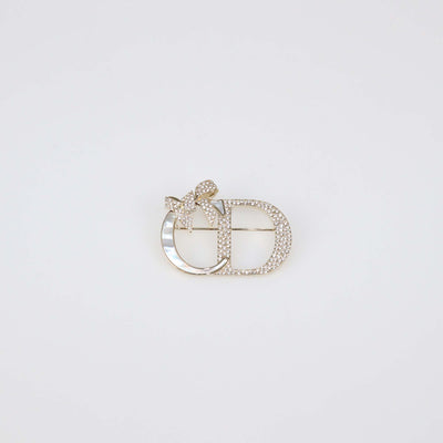 Christian Dior Gold Finish Metal Mother of Pearl Dior Shiny Bow Brooch