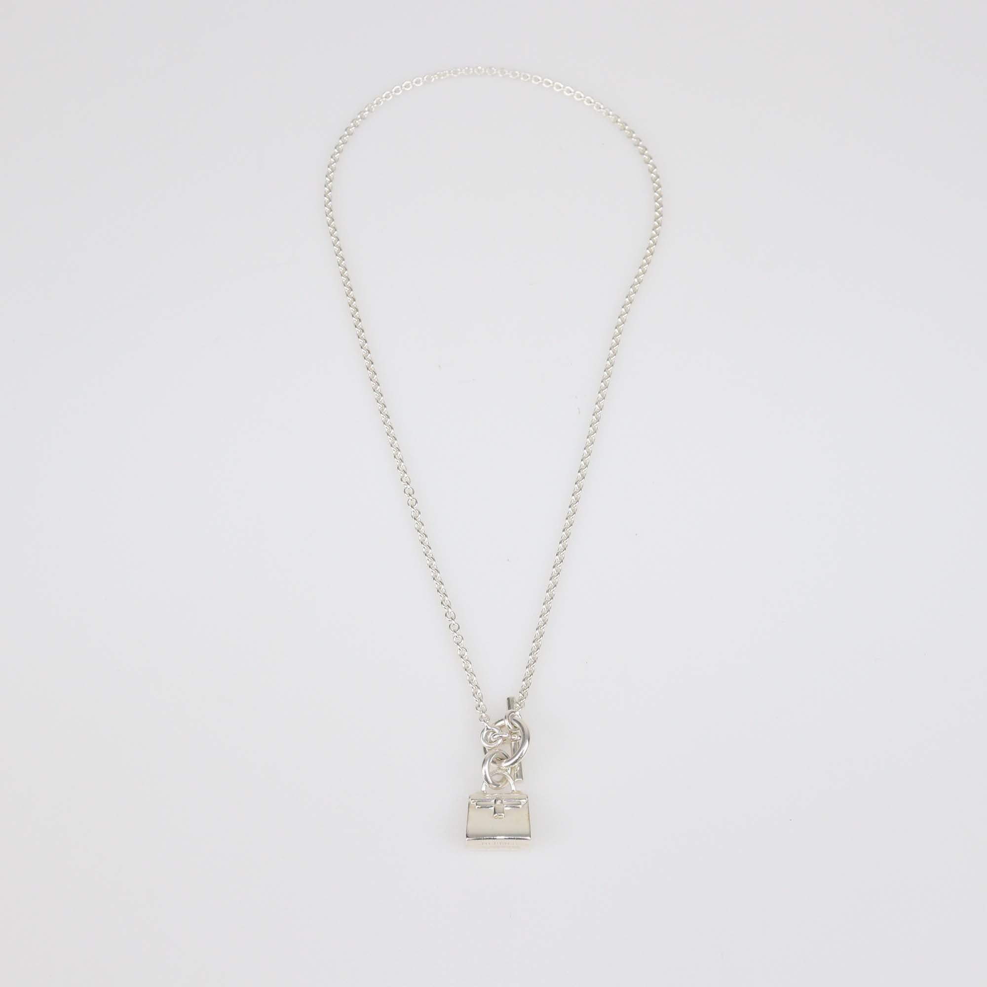 Hermes Sterling Silver Amulettes Kelly Pendant Necklace