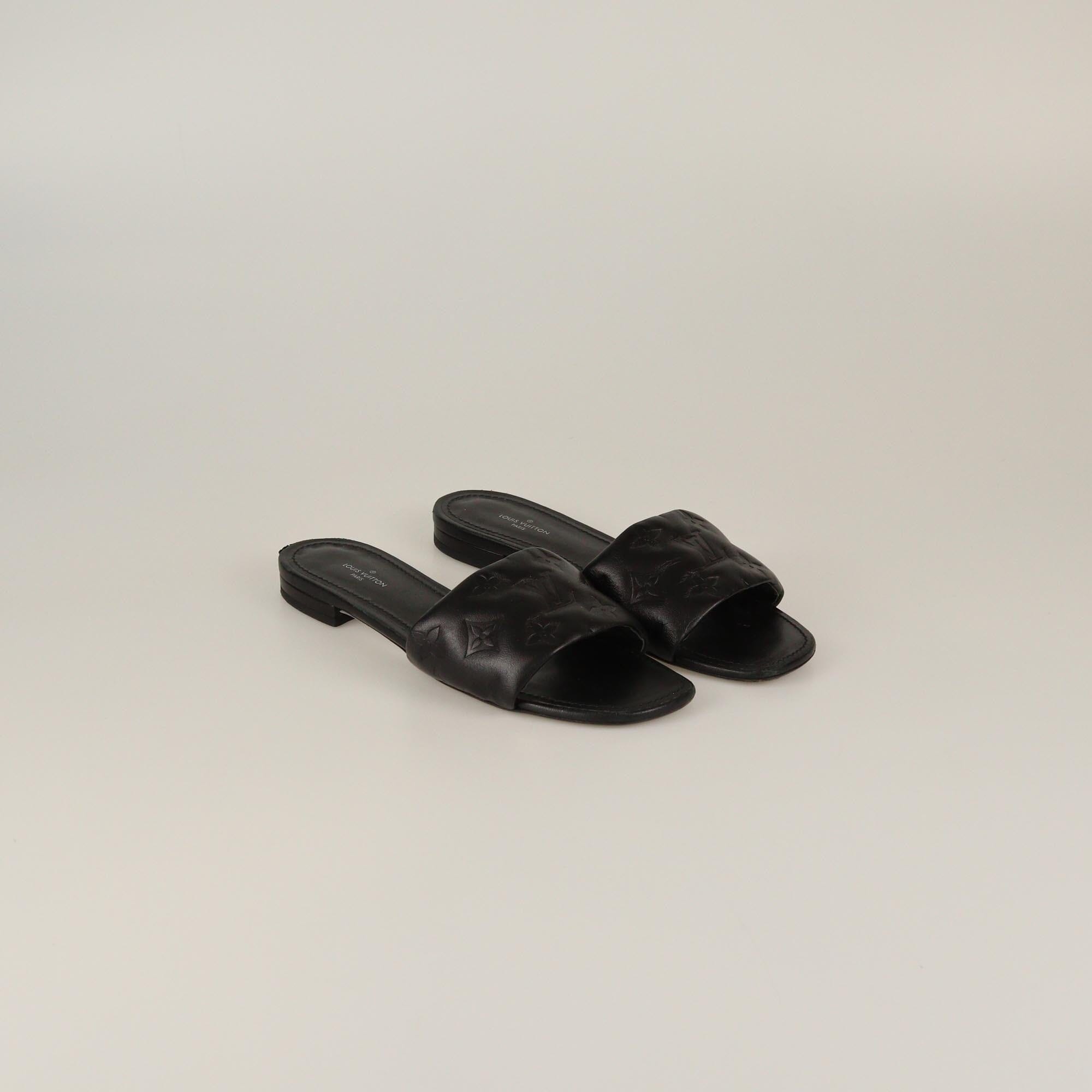 Louis Vuitton Black Monogram Embossed Revival Flat Slides Womens Louis Vuitton 