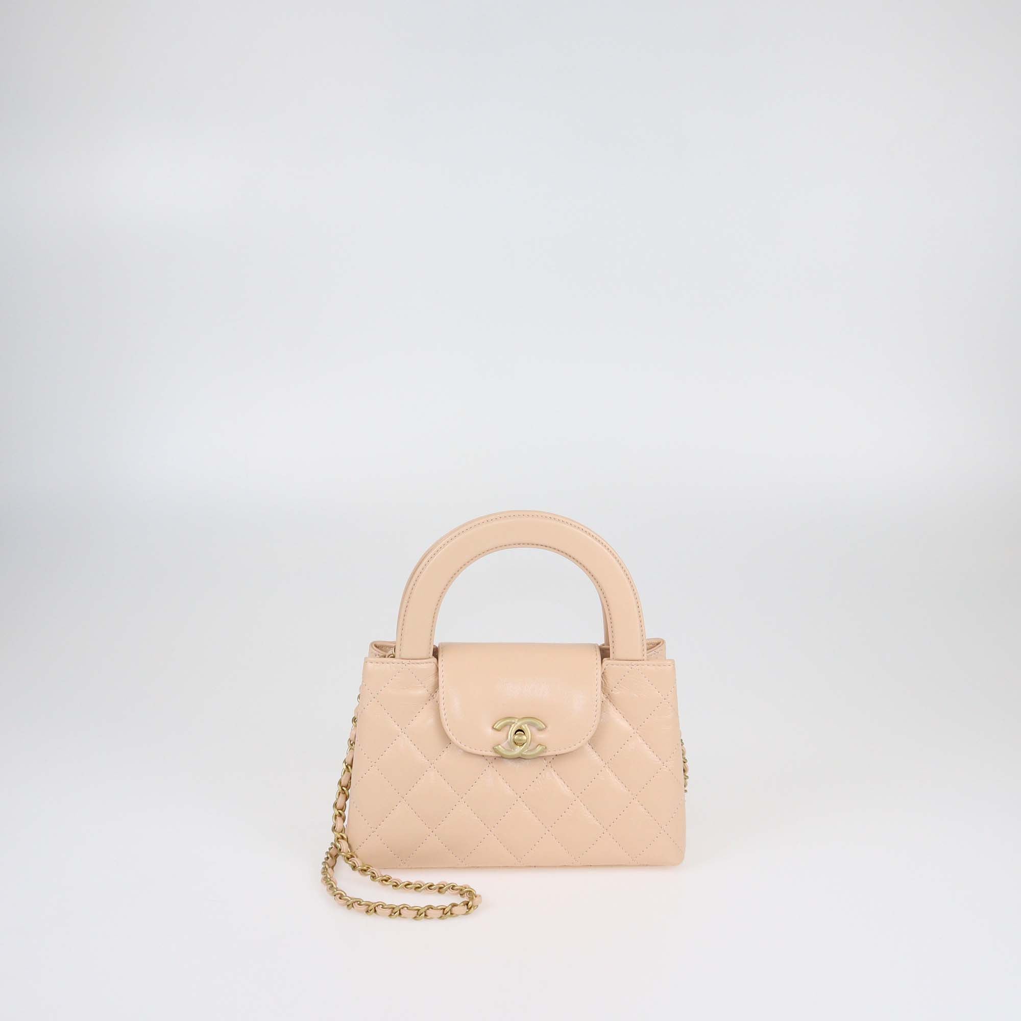 Chanel Blush Pink Quilted Leather Mini Kelly Top Handle Bag